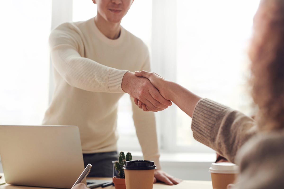 Ppc Management Proven Ppc Management Partnership Handshake