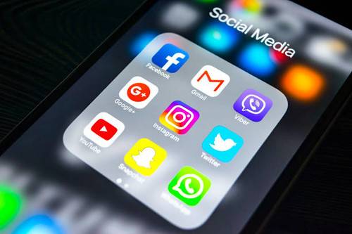 Social Media Marketing Smartphone Showing Social Media Platform App Icons Including Facebook Instagram And Youtube